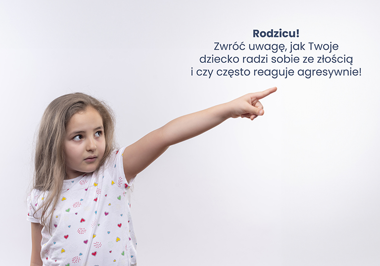 looking at side little school girl wearing white t-shirt points to side on isolated white background