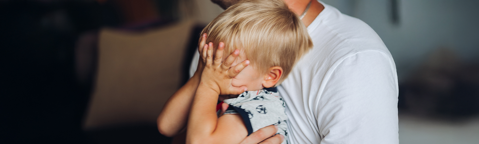 The baby is crying. The little boy is crying heavily.