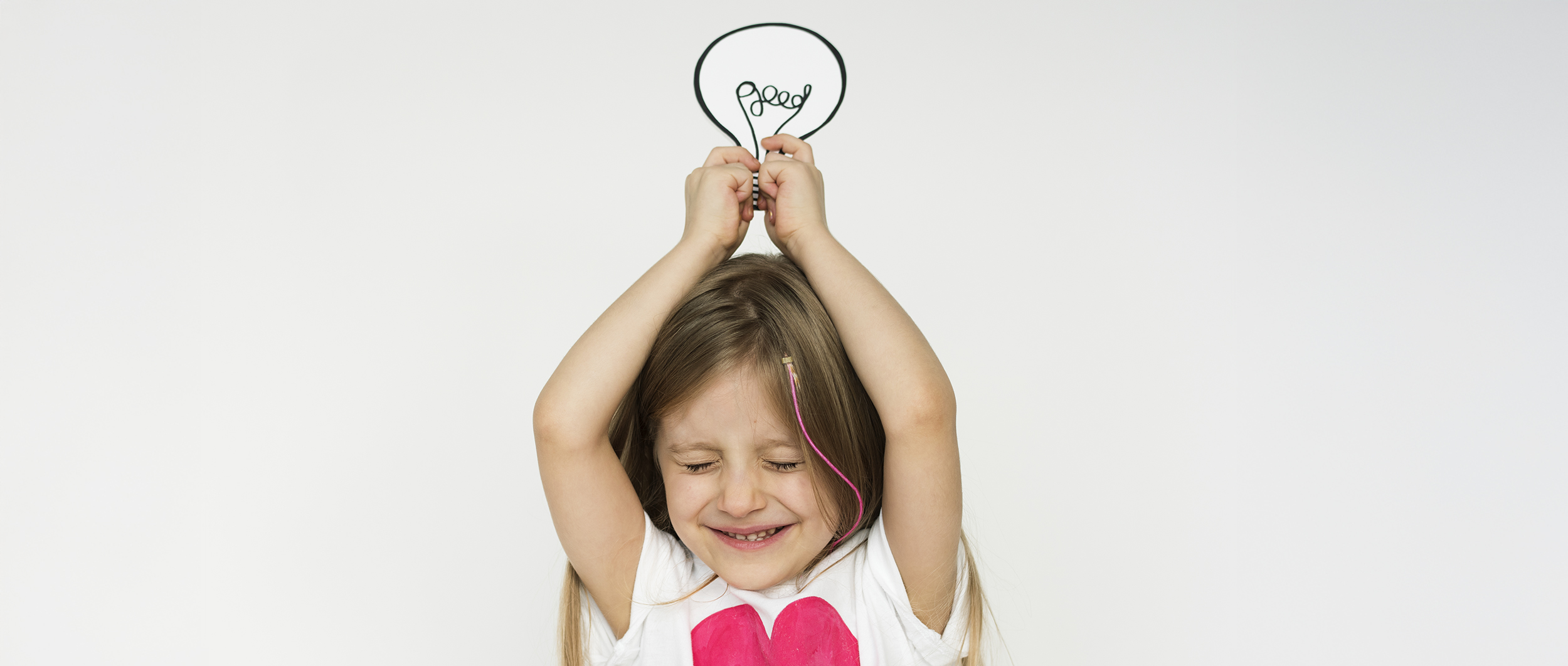 Little girl with a light bulb